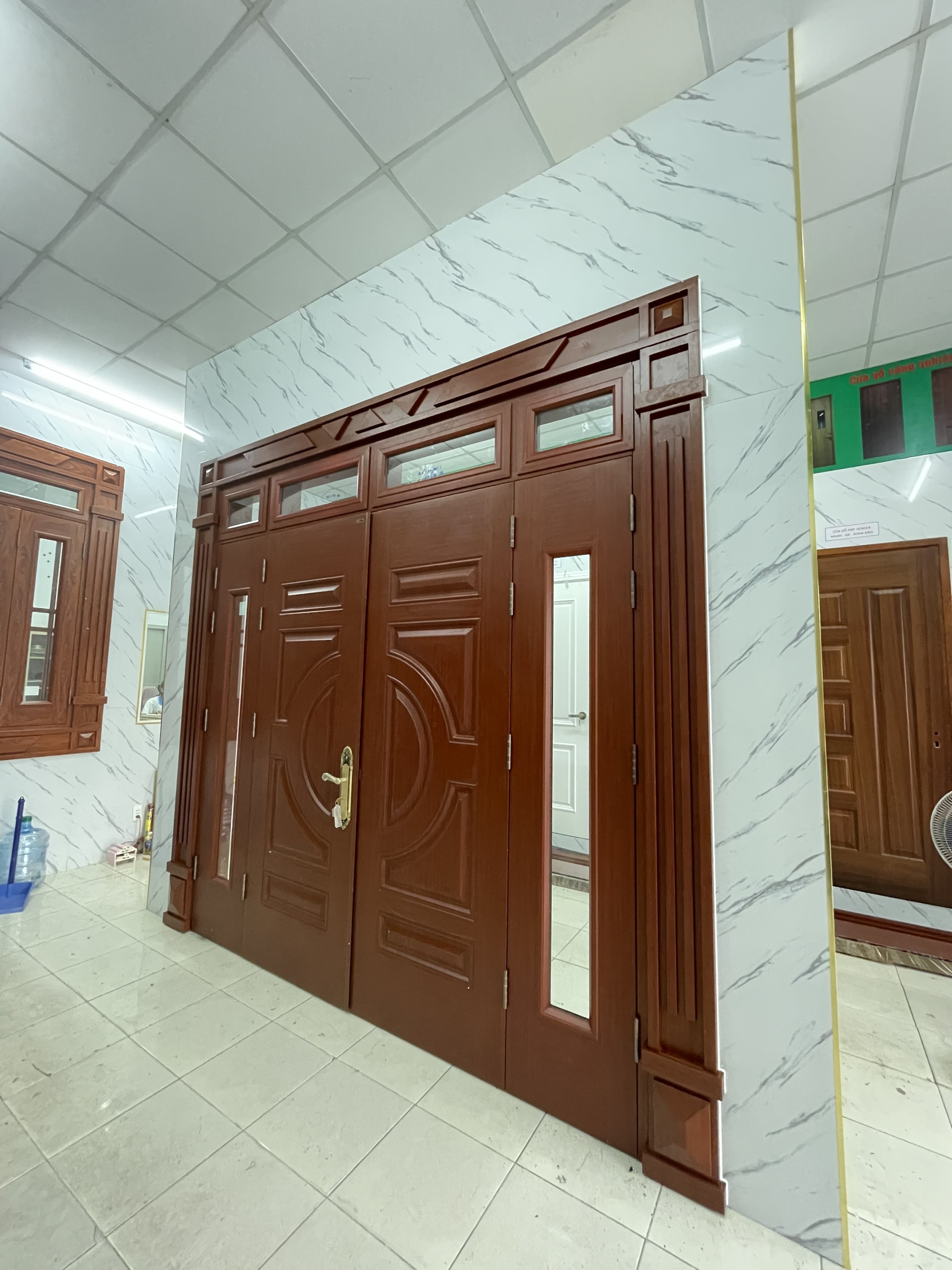 Mẫu cửa thép vân gỗ tại Thủ Đức- Cửa 4 cánh, cửa sổ,...