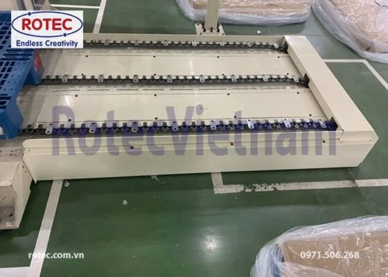 Hệ thống băng tải xích dẫn Pallet Rotec