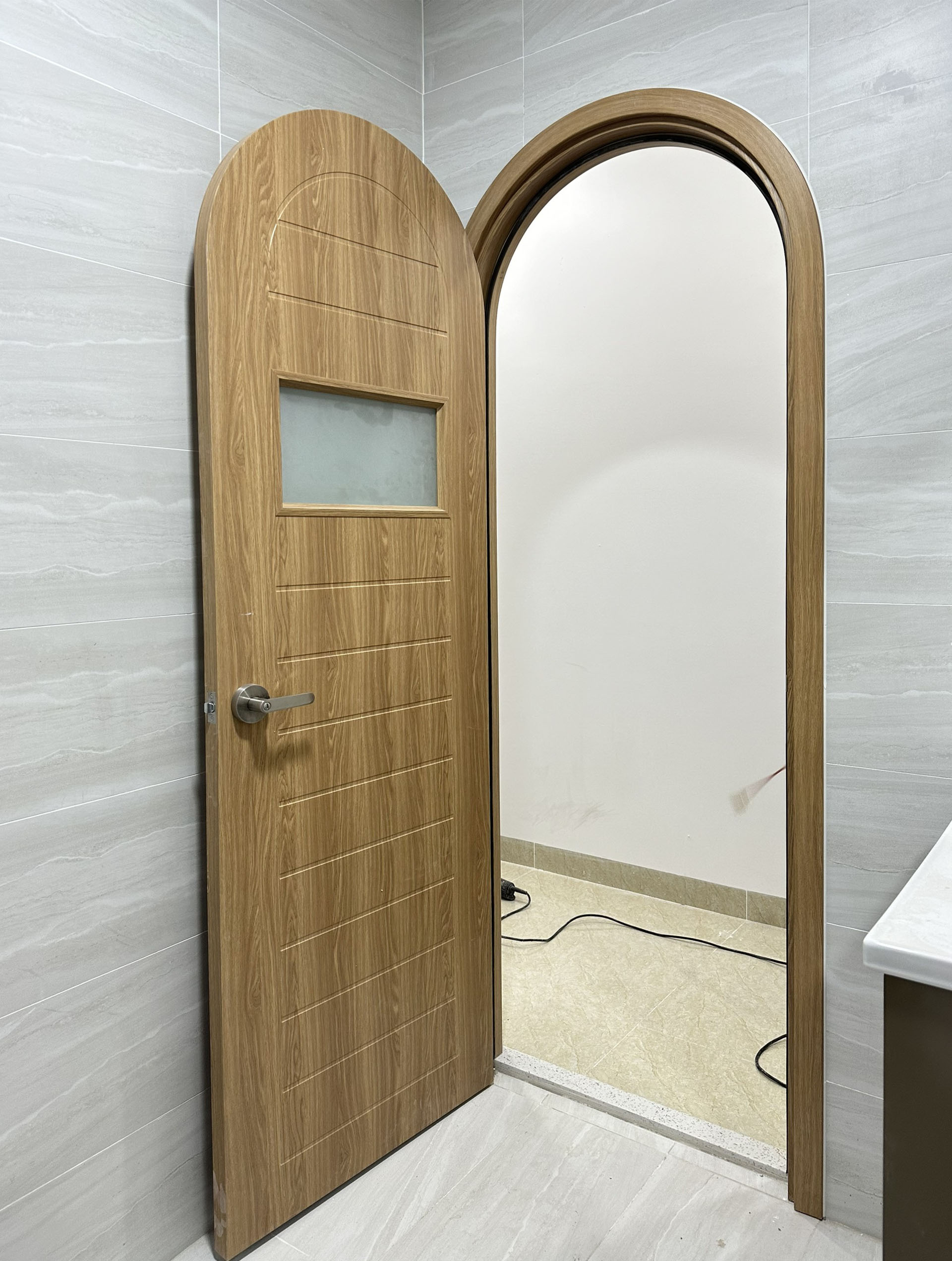 Cửa vòm nhựa composite tại Quận 10 - Mẫu cửa vòm cong hiện đại