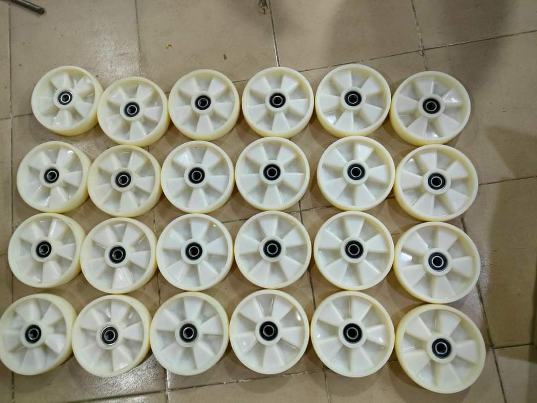 Bánh xe nâng tay kéo pallet nylon trắng 180x50mm