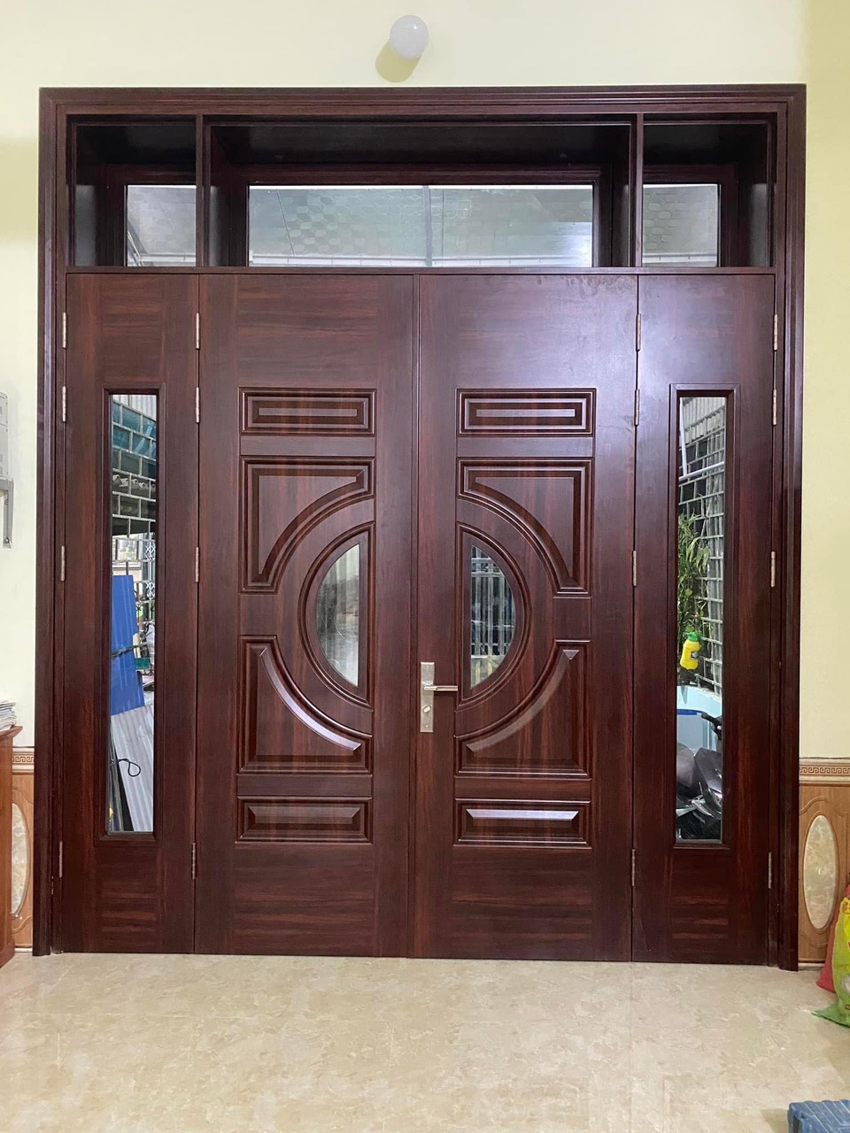 Cửa Thép vân gỗ tại Cà mau - giá chi tiết các loại