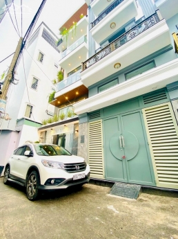 Bán nhà phố liền kề 1 trệt 1 lững 3 lầu hẽm xe hơi 7 chỗ đậu trong nhà