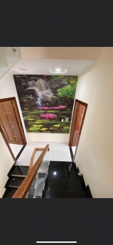 Nhà 2 lầu,sân thượng.MT đường 13m,Sổ riêng chính chủ