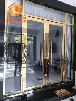 Cửa Kính Cường Lực Khung Inox Vàng Gương - nhận gia công inox theo yêu