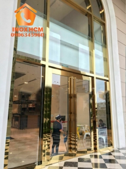 Cửa Kính Cường Lực Khung Inox Vàng Gương - nhận gia công inox theo yêu