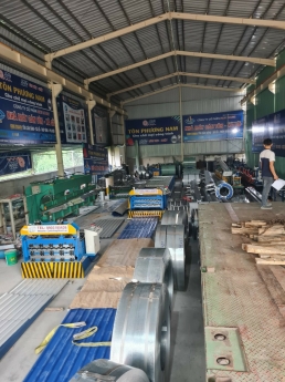 Máy cán tôn 2 tầng 9 sóng và 13 sóng laphong có dập vòm