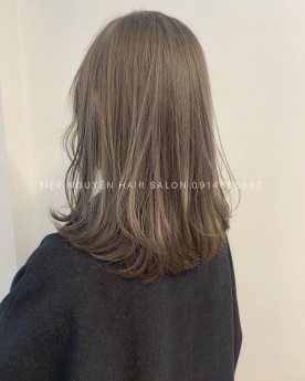 Tóc xoăn sóng lơi ngang vai cho nàng mặt vuông Tiệp Nguyễn Hair Salon