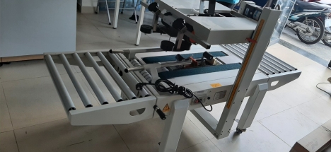 máy dán thùng, máy dán thùng mặt trên mặt dưới, máy dán băng dính thùng carton