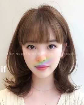 Nhuộm tóc màu nâu tây tôn da siêu sáng cho nàng tóc xoăn ngang vai Tiệp Nguyễn Hair Salon