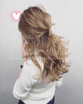 Tóc uốn sóng lơi ngang lưng để mái bay cho nàng mặt tròn - Tiệp Nguyễn Hair Salon