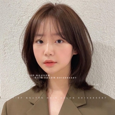 Tóc layer đuôi vểnh cho nữ mặt tròn - Tiệp Nguyễn