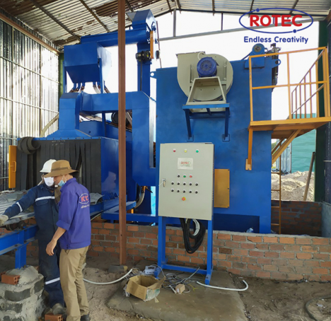 Máy Phun Bi Băng Tải Con Lăn