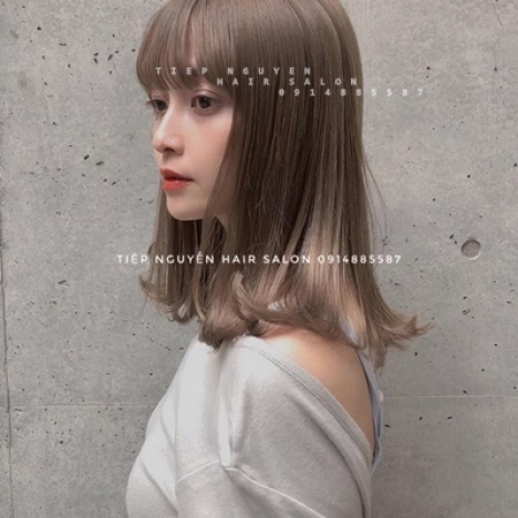 Tóc xoăn ngắn hippie mái mưa - Tiệp Nguyễn Hair