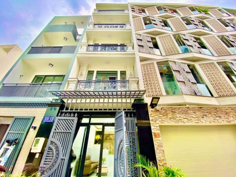 Bán nhà Hòa Bình Quận 11, xe hơi 7 chỗ đỗ cửa, 5 tầng THANG MÁY, 75m2 chỉ 12 Tỷ 6 TL