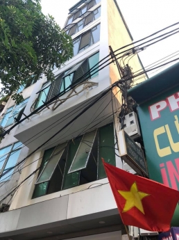 Tòa VP đường Giáp Bát  6 tầng, thang máy đường oto tránh 9.6 tỷ