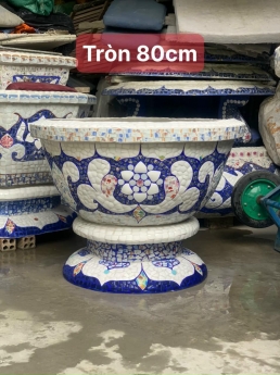Nghệ nhân dán miễng sành sứ - ốp sành - chuyên chậu hoa khảm sành sứ