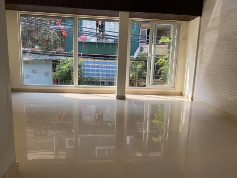 BIỆT THỰ  ĐỐNG ĐA - VỊ TRÍ ĐẸP -GaRa  Ô TÔ , 4M RA ĐƯỜNG Ô TÔ TRÁNH - KINH DOANH