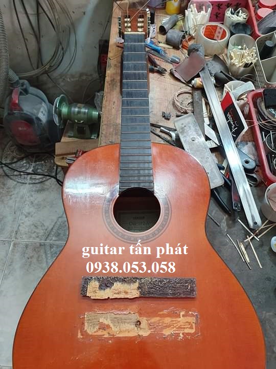 Nhận sửa đàn guitar giá rẻ tại huyện hóc môn guitar tấn phát