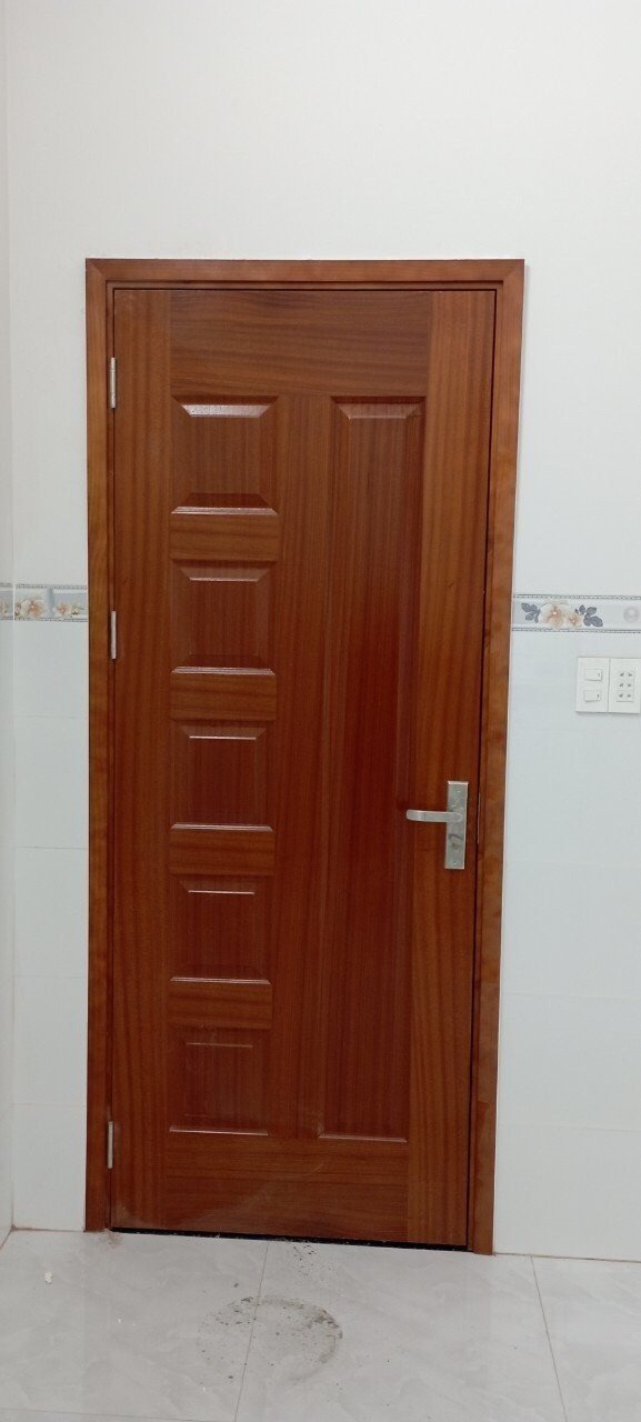cửa gỗ công nghiệp tại long an- cửa nhựa gỗ Hoabinhdoor