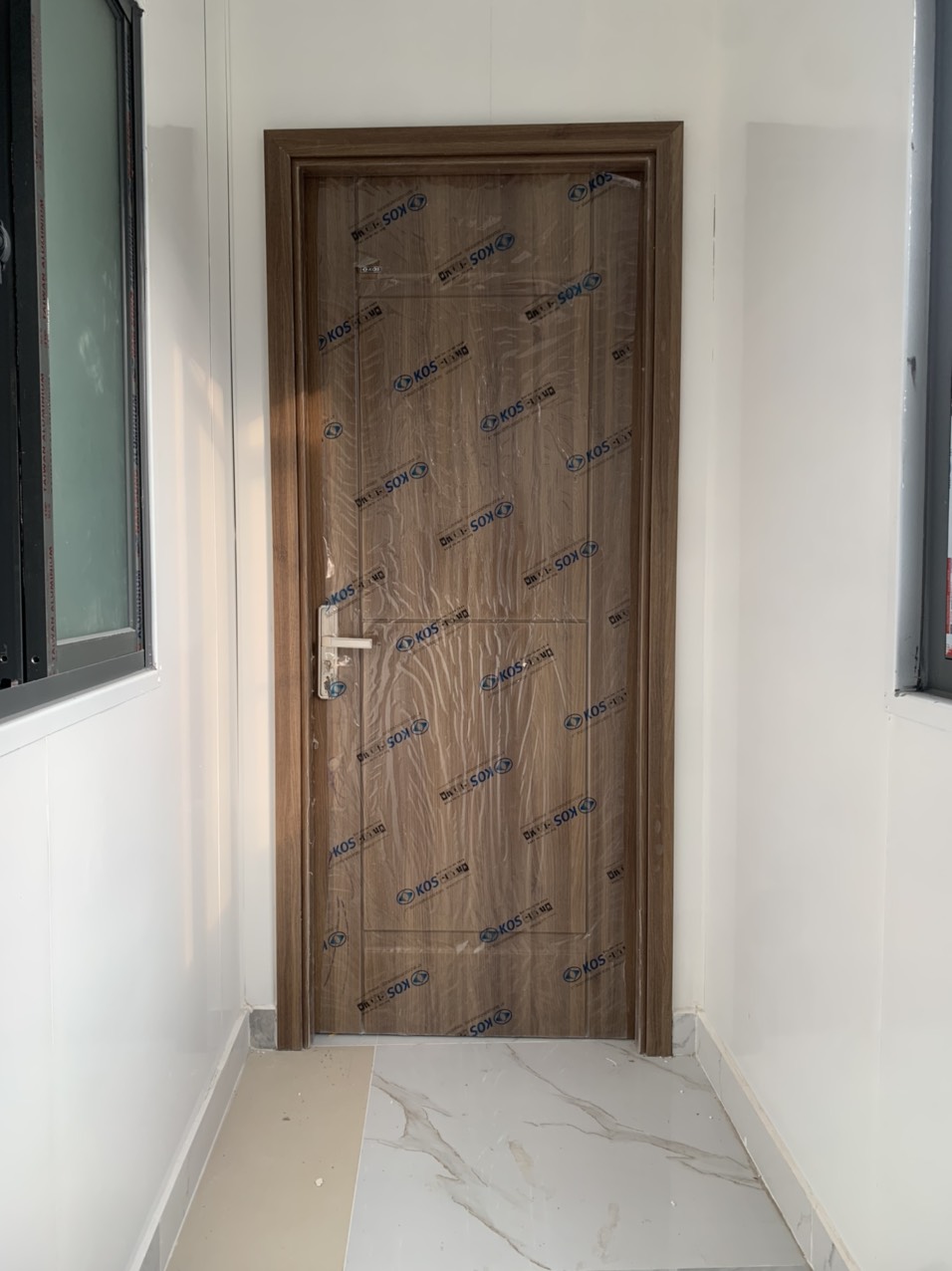 Báo giá cửa nhựa giả gỗ abs hàn quốc thương hiệu kos